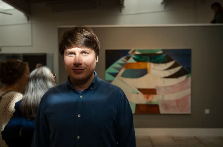Thumbnail of - Jens Dam Ziska with his artwork at the National Gallery in the Faroe Islands.