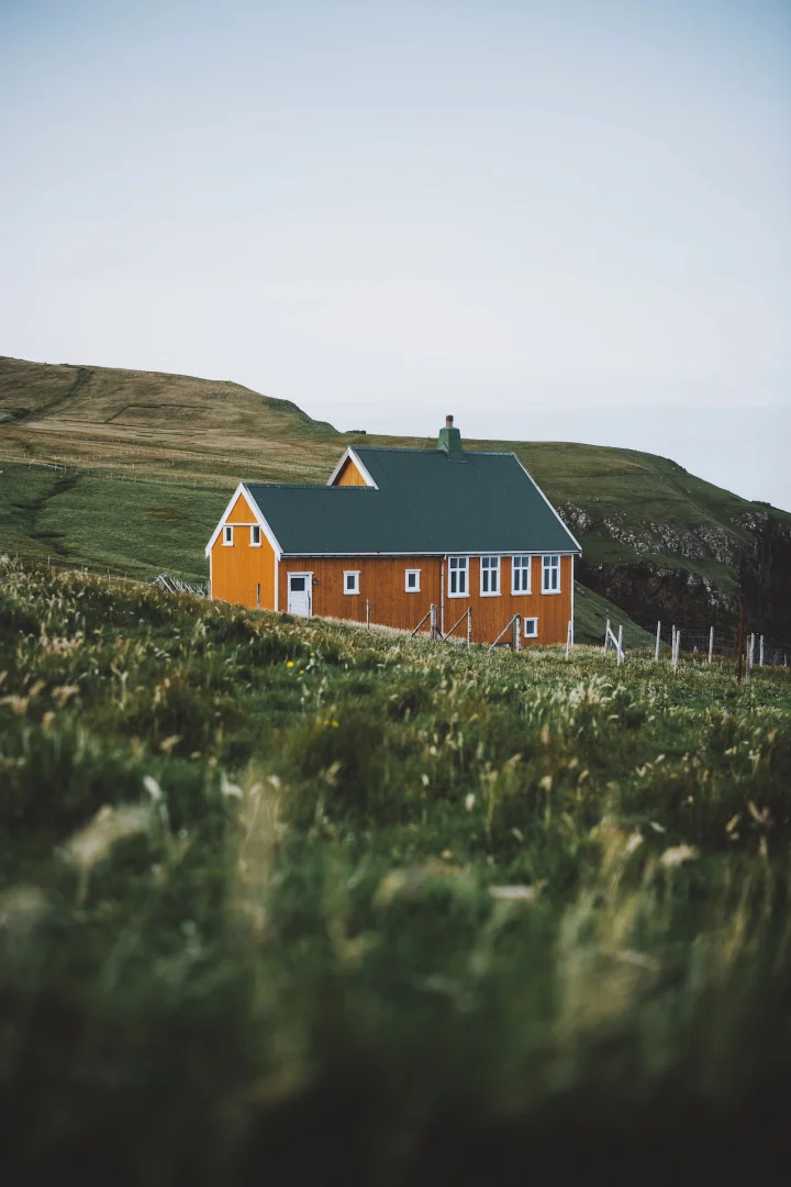 Thumbnail of - A yellow house in nature on the islands, Suðuroy, Faroe Islands.