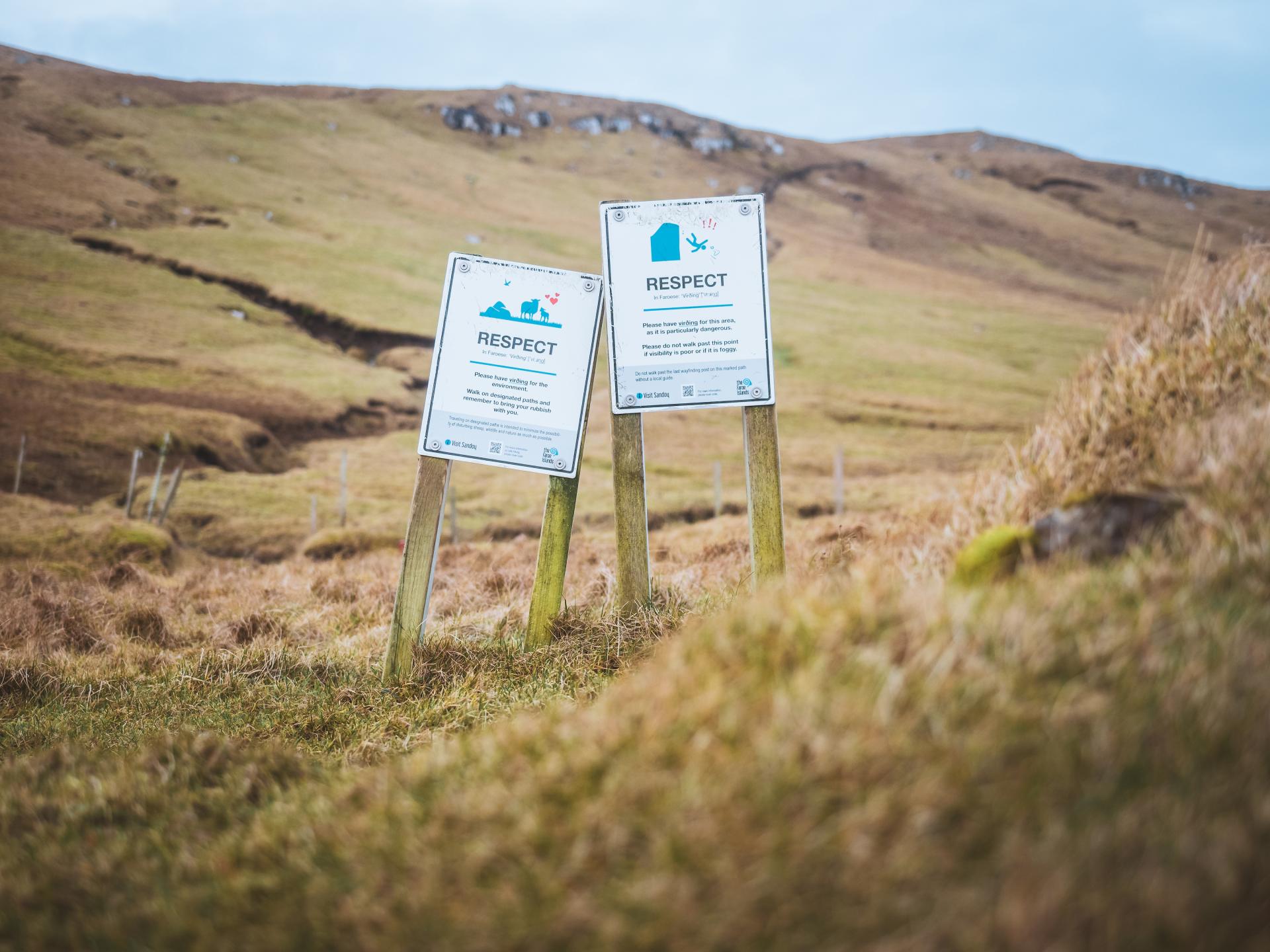 Thumbnail of - Respect signs are seen in the mountains on a hike to Sandoy in the Faroe Islands. Take by Daniel Villadsen.