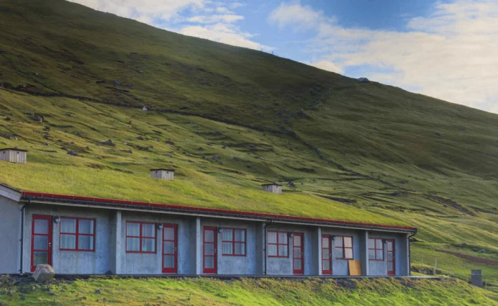 In picturesque surroundings, far away from the treadmill of reality, Gjáargarður is the most charming hotel in the Faroe Islands