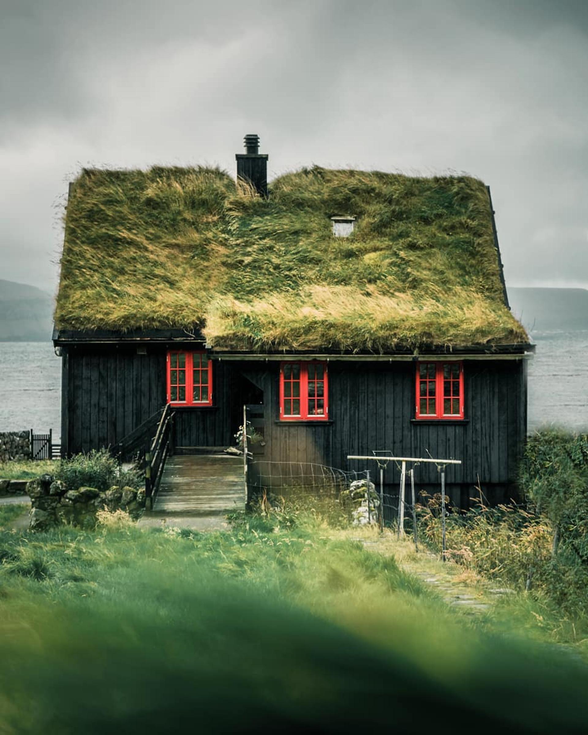 Thumbnail of - The Faroe Islands are like heaven! Every couple of kilometers you will see some houses with grass roofs, or other amazing cabins.