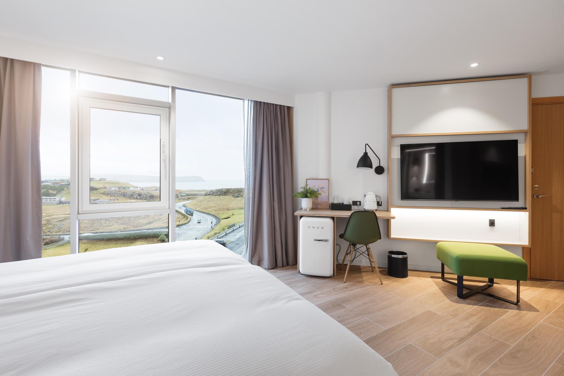Thumbnail of - Hotel Hilton Garden Inn, a beautiful view out of the green landscape in the Faroe Islands