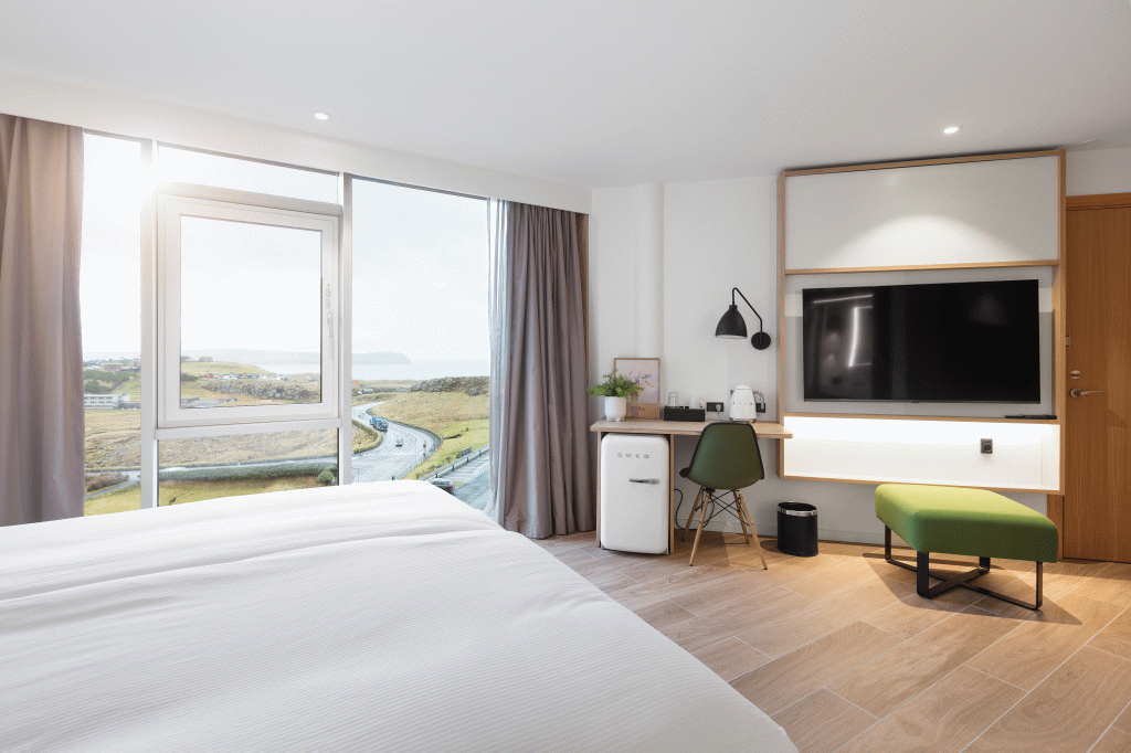Hotel Hilton Garden Inn, a beautiful view out of the green landscape in the Faroe Islands