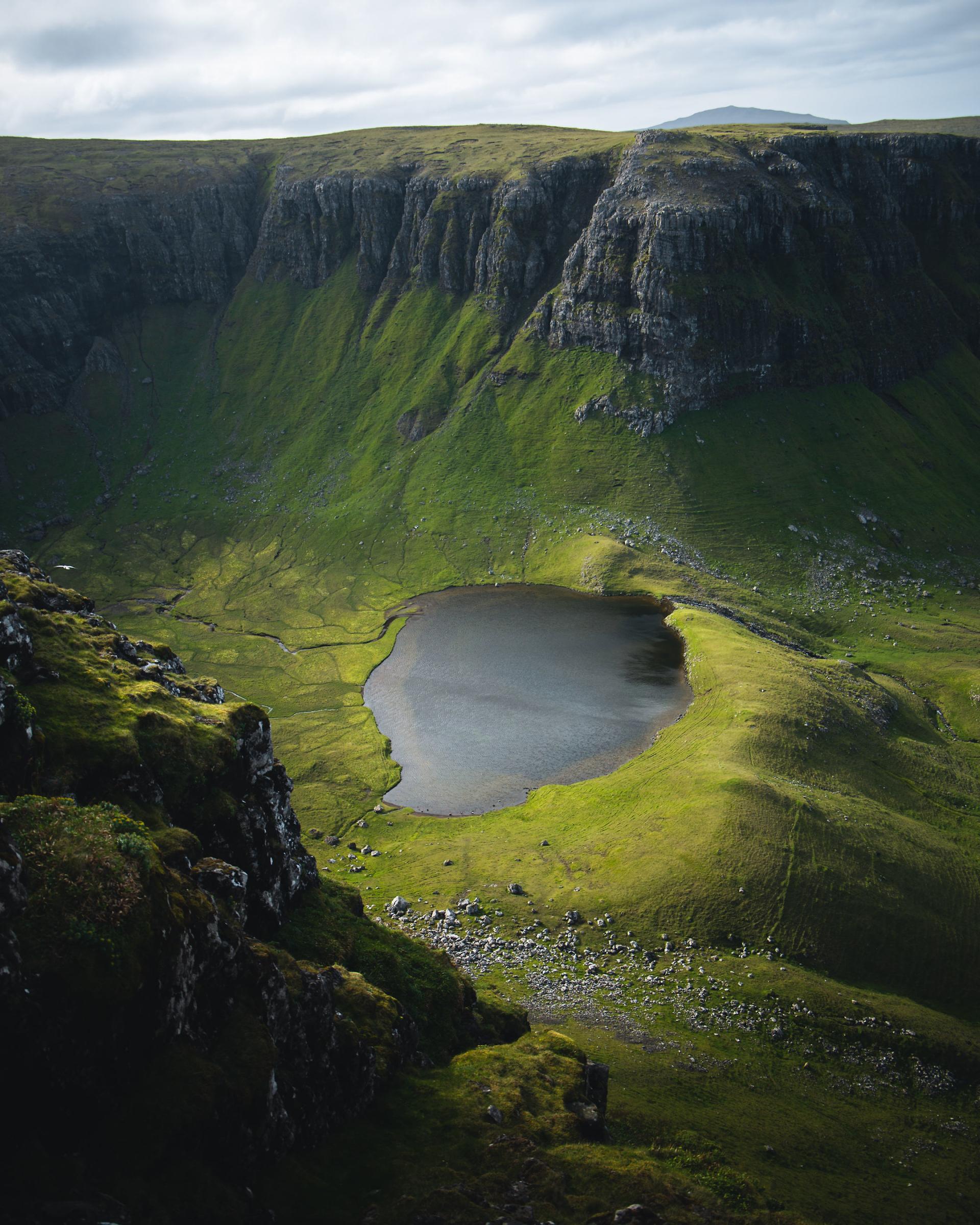 Beautiful lake in Suðuroy, Faroe Islands. Green mountains and stunning nature. 